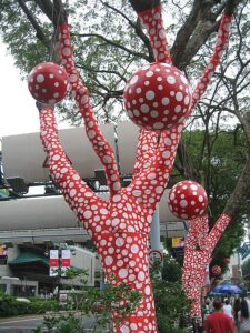 Yayoi Kusama - Ascension of Polkadots on the Trees at the Singapore Biennale 2006. By Terence Ong - Own work, CC BY-SA 3.0